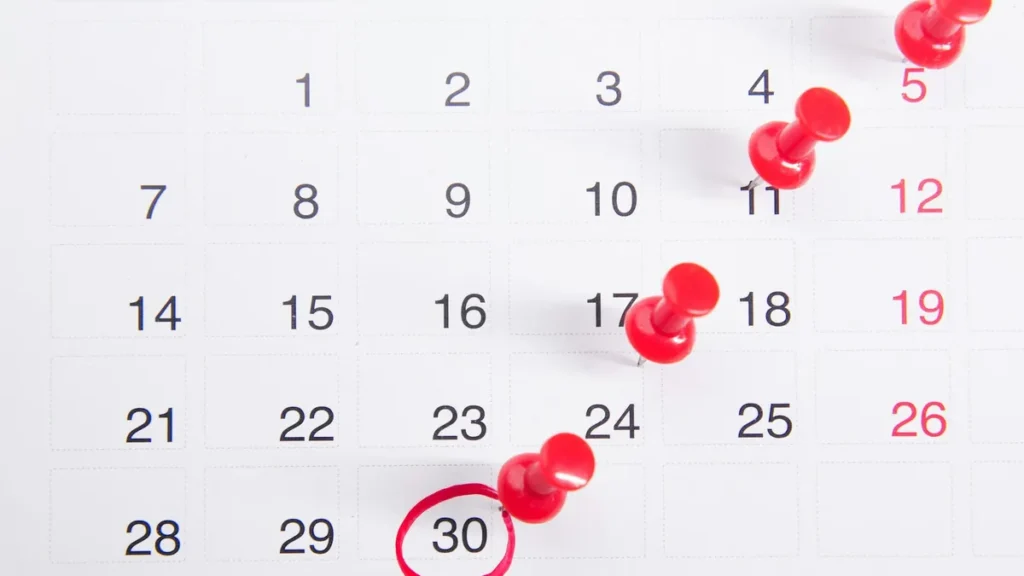Desk calendar with dates marked to track a 60-day deadline